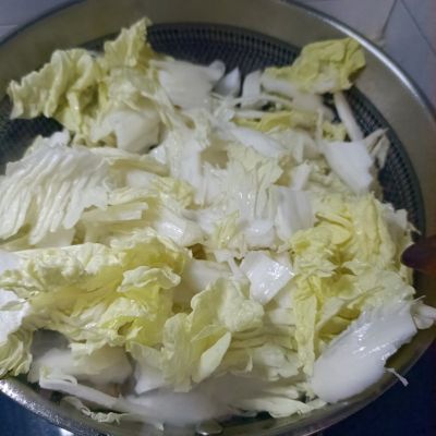 奶白菜花肉炖粉条的做法步骤：9